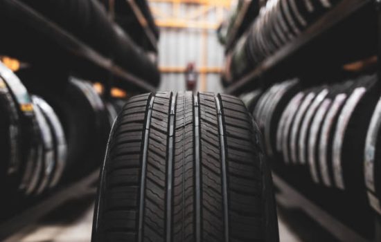 A new tire is placed on the tire storage rack in the car workshop. Be prepared for vehicles that need to change tires.